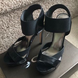 Black snake Bebe heels